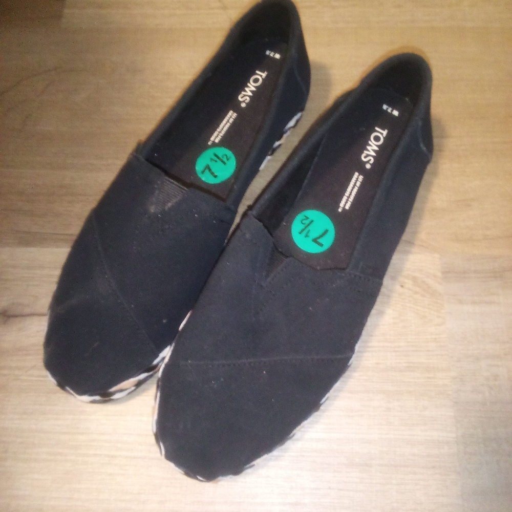 Toms black braided slip ons